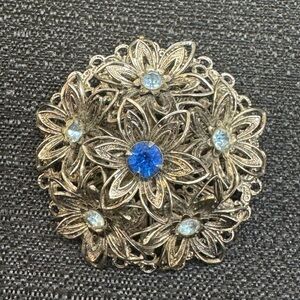 Vintage-Style Silver Floral Brooch with Blue Rhinestones